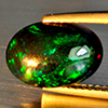 Natural Multi Color Play Of Colour Opal Gemstones 2.31 Ct. Oval Cabochon Shape 12.2 x 8.6 Mm. Natural Multi Color Play Of Colour Opal Gemstones 2.31 Ct. Oval Cabochon Shape 12.2 x 8.6 Mm.