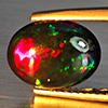 Natural Multi Color Play Of Colour Opal Gemstones 1.77 Ct. Oval Cabochon Shape 12.3 x 10.1 Mm. Natural Multi Color Play Of Colour Opal Gemstones 1.77 Ct. Oval Cabochon Shape 12.3 x 10.1 Mm.