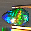 Natural Multi Color Play Of Colour Opal Gemstones 1.36 Ct. Pear Cabochon Shape 11.5 x 7.5 Mm. Natural Multi Color Play Of Colour Opal Gemstones 1.36 Ct. Pear Cabochon Shape 11.5 x 7.5 Mm.