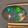 Natural Multi Color Play Of Color Rainbow Opal Gemstones 2.47 Ct. Oval Cabochon Shape 13.2 x 9.4 Mm. Natural Multi Color Play Of Color Rainbow Opal Gemstones 2.47 Ct. Oval Cabochon Shape 13.2 x 9.4 Mm.