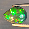 Natural Multi Color Play Of Color Rainbow Opal Gemstones 1.26 Ct. Pear Cabochon Shape 10.6 x 7.8 Mm. Natural Multi Color Play Of Color Rainbow Opal Gemstones 1.26 Ct. Pear Cabochon Shape 10.6 x 7.8 Mm.