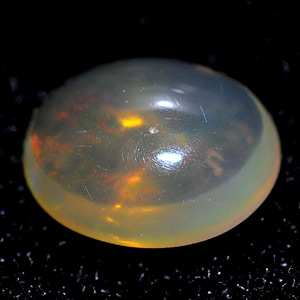 0.79 Ct. Oval Cabochon Natural Multi Color Opal Sudan