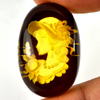 Women In Brown Yellow Amber 14.79 Ct. Oval Cabochon Shape 27 x 18 Mm. Natural