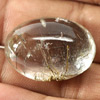 36.57 Ct. Oval Cabochon Natural White Black Rutilated Quartz Unheated